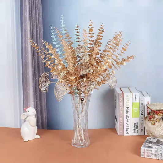 Composition florale dorée, feuilles de palmier artificielles en plastique